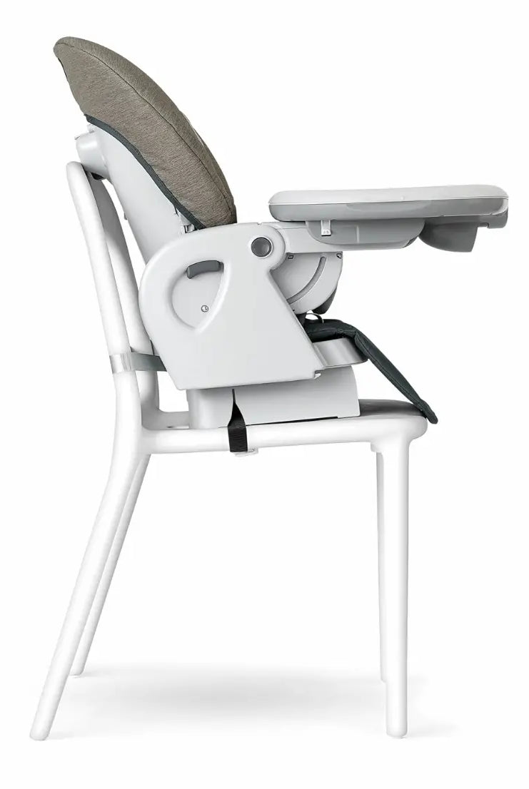 Upright Chicco Polly Progress 5-in-1 high chair rental in Panama with tray attached