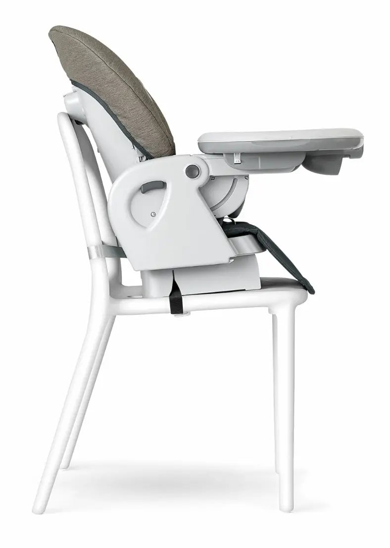 Upright Chicco Polly Progress 5-in-1 high chair rental in Panama with tray attached